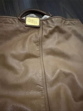 Brown Leather Tote with Gold Logo Plaque